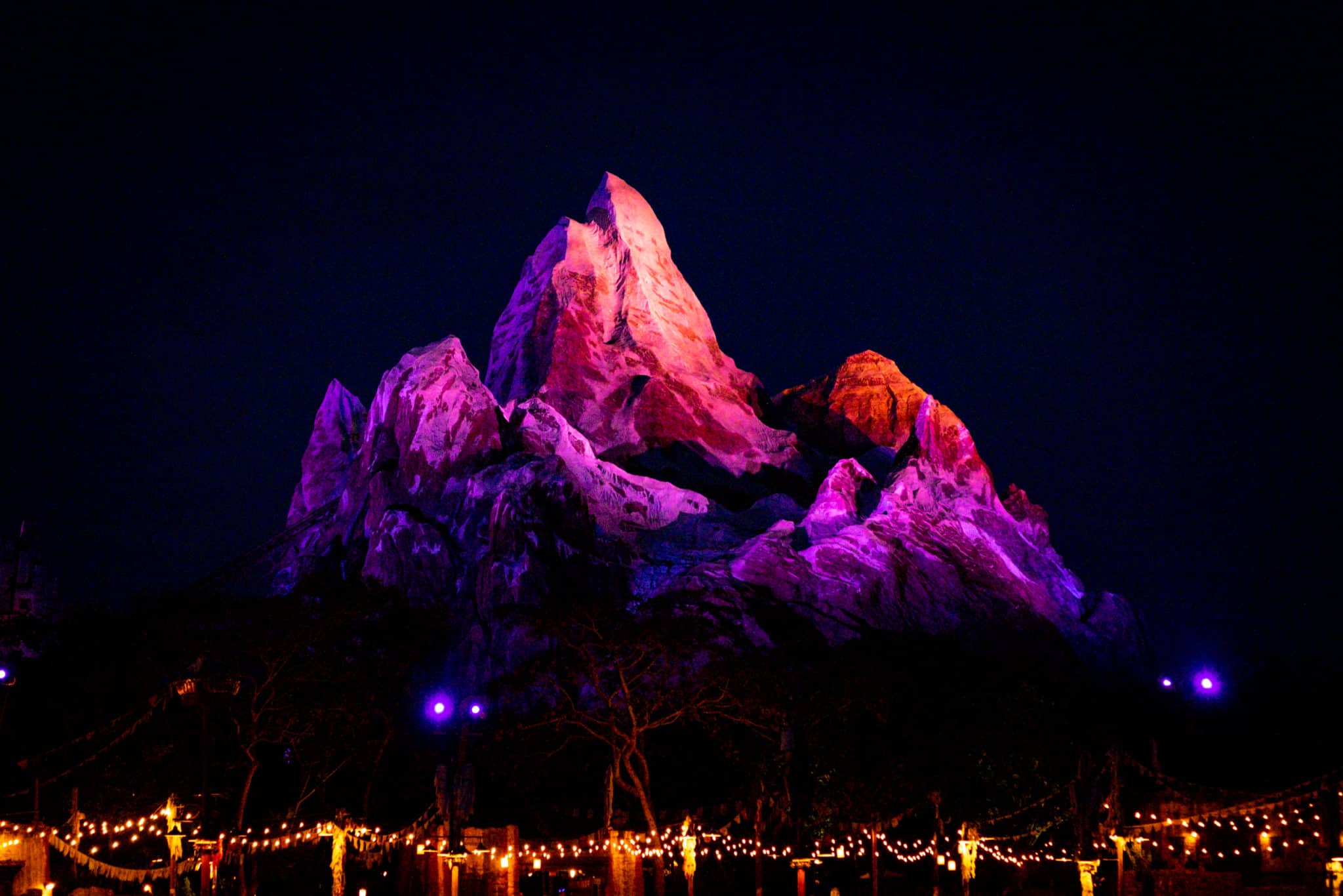Expedition Everest lit up at night