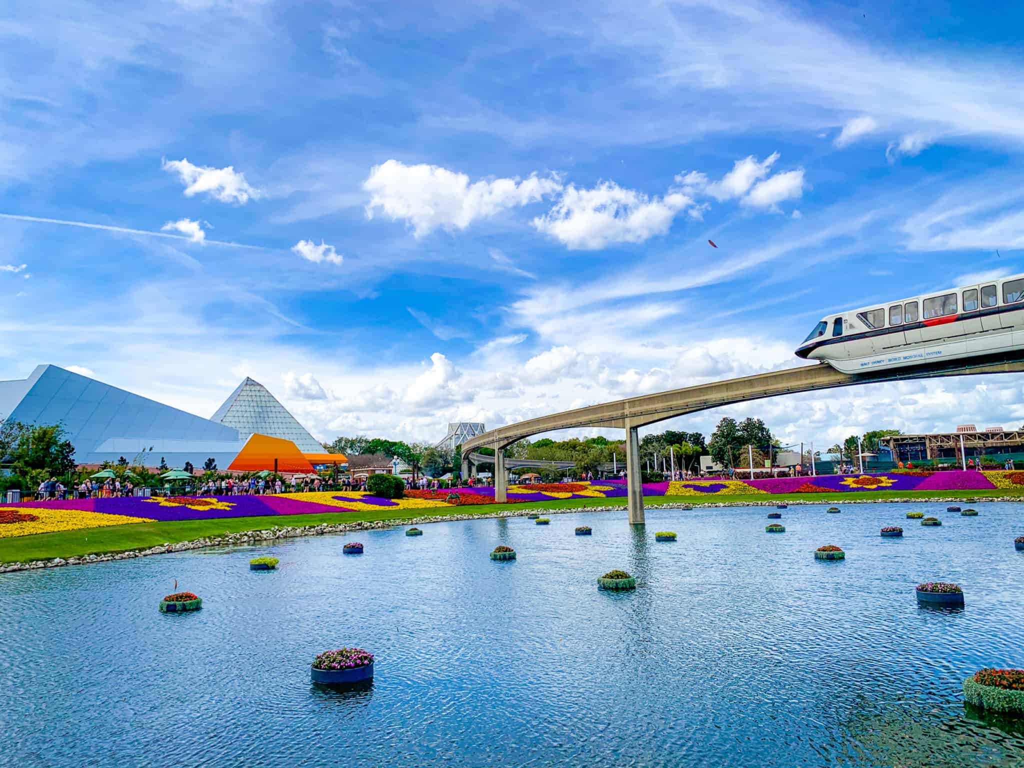 EPCOT Flower and Garden Festival garden path with topiaries