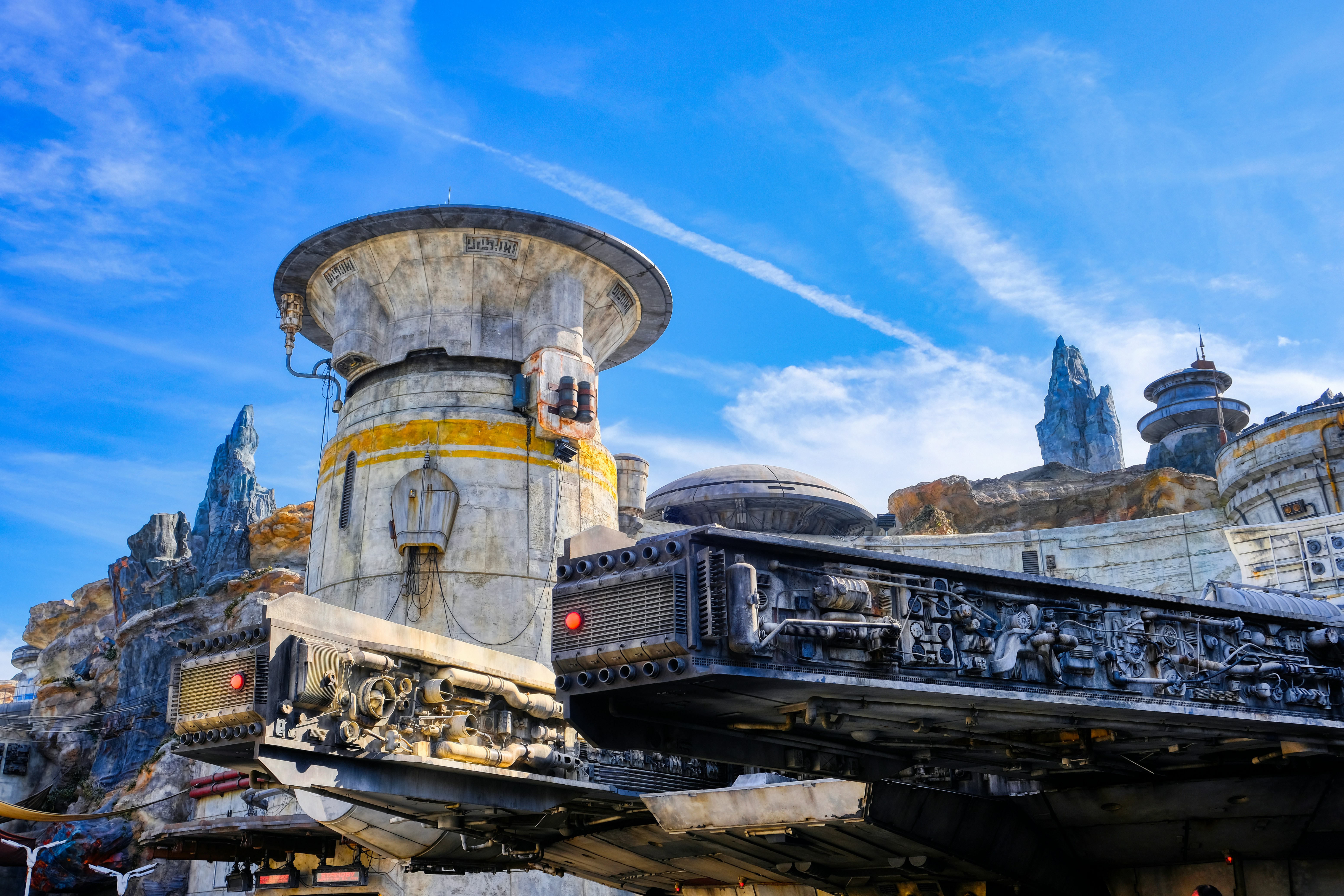 Star Wars Galaxy's Edge daytime view with the distinctive architecture and theming of Black Spire Outpost